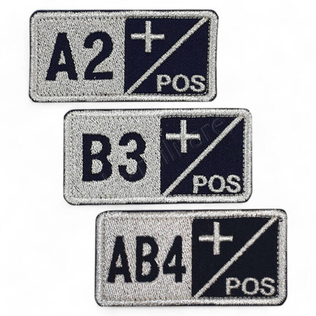 Blood group A+ badge embroidered on ultramarine with metallic thread - sewing application